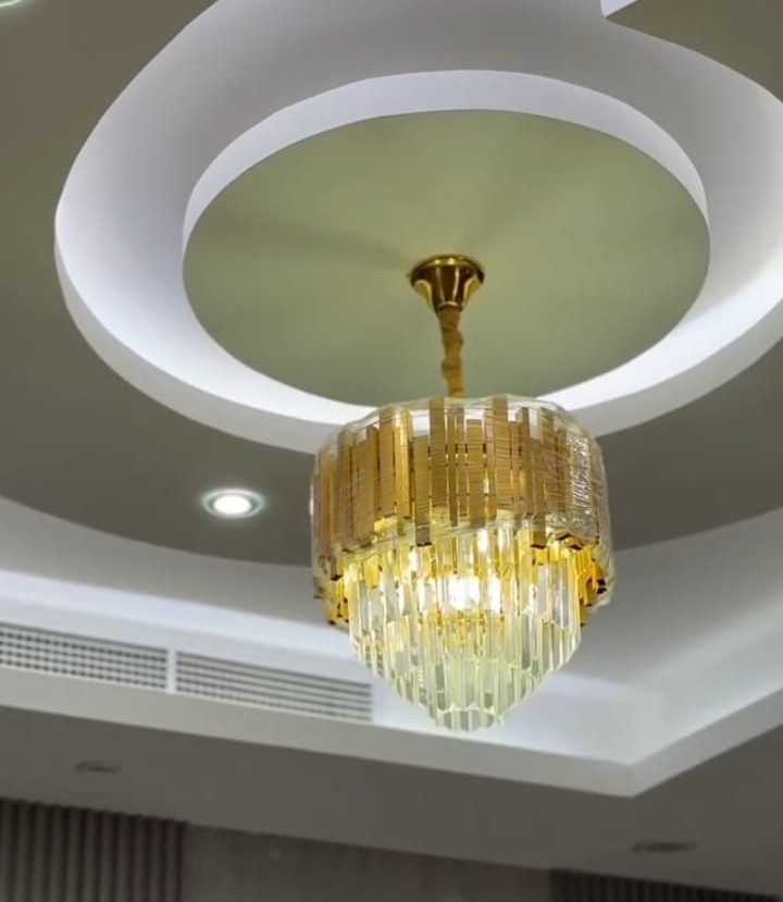 Cove lighting and chandelier scene — AuraNest Dubai villa